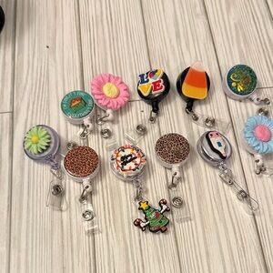 11 piece. Colorful Badge Reel Set